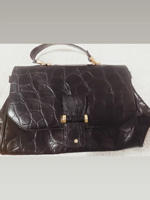 Vintage black leather handbag with crocodile texture and gold details