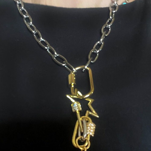 Long pendant with silver chain and gold rings, star and diamond-shaped drop