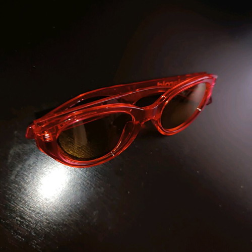 Polaroid PLD 6051/G/S sunglasses like new, transparent red with orange lens