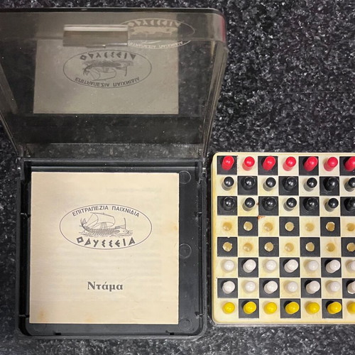 Travel checkers board game used, few damages
