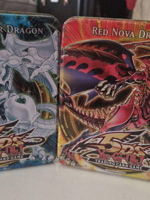 Yu-Gi-Oh! Tins 2010 used, empty set of 2 with Shooting Star Dragon and Red Nova Dragon
