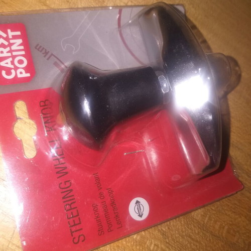 Steering wheel spinner new in packaging for any car