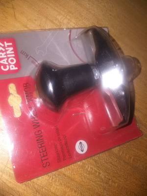 Steering wheel spinner new in packaging for any car