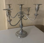 Large silver-plated candlestick used
