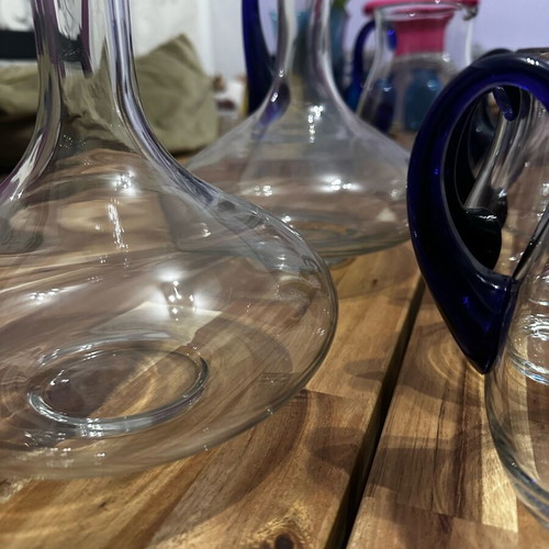Set of 10 blown glass pitchers like new with cheese platter