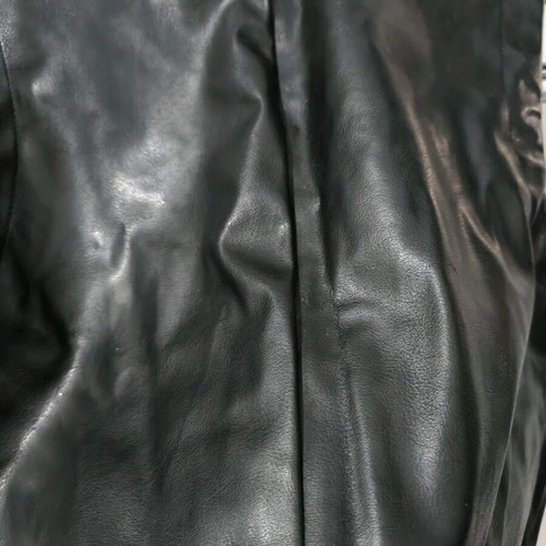 Black faux leather sleeveless vest with fringes like new