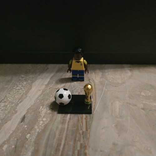 Pele collectible figure with World Cup trophy like new