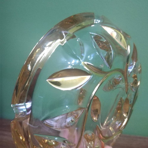 Crystal ashtray used, heavy with embossed gold-plated designs