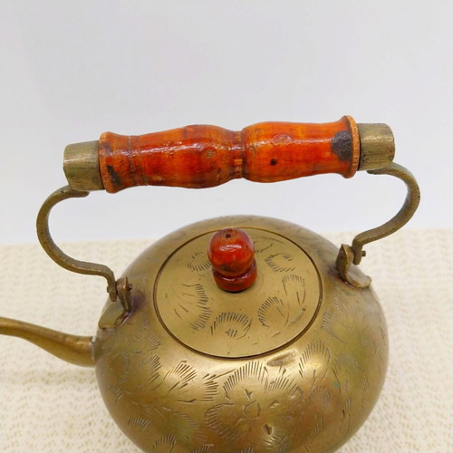 Vintage brass decorative teapot with wooden handle used, England