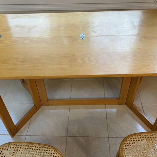 Multifunctional table with two used Viennese wicker chairs