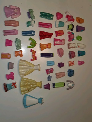 Pollypocket dolls with clothes and accessories used