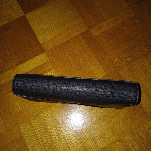 Black wallet slightly used with multiple compartments