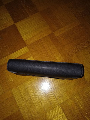 Black wallet slightly used with multiple compartments