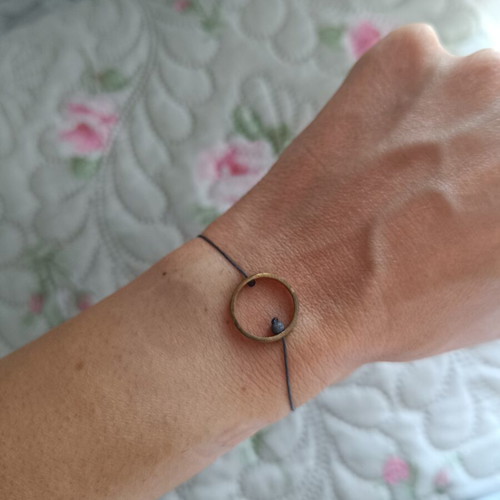 Bracelet with adjustable cord, like new, gray and gold