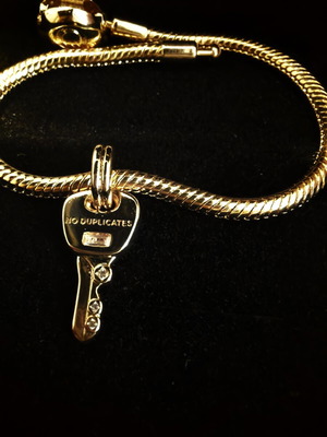 Pandora charm key dangle like new, gold plated