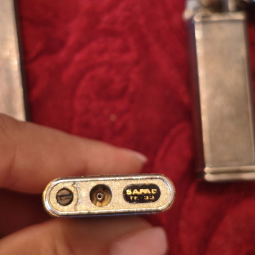 Lot of 7 Vintage lighters including Zippo, Porsche Design, Maruman