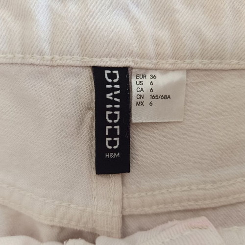 H&M high-waist denim shorts used, white with pale pink accents, size S