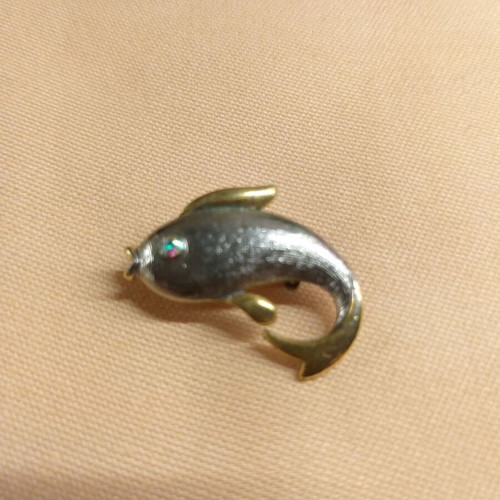 Dolphin pin used, silver and gold color