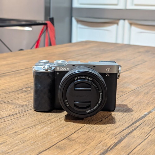 Sony a7c camera kit new with flash, tripod, bag, and 64GB memory card