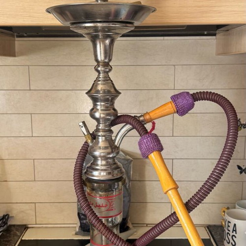 Khalil Maamoon Egyptian hookah used with tobacco cooling accessory and coals