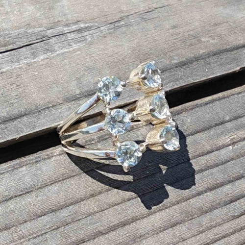 Silver ring with blue topaz