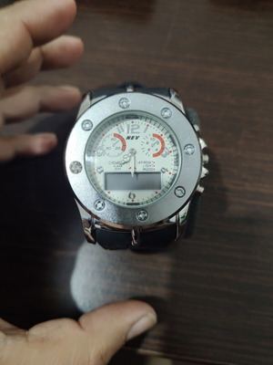 Nev wristwatch new with light and small electric dial