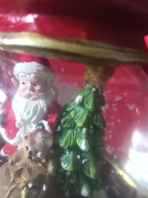 Christmas souvenir like new with Santa Claus and falling snow