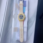 Swatch unisex watch with new yellow silicone strap, like new