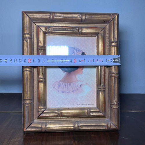 Golden frame used, wooden carved