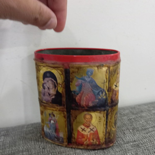 Vintage metal pencil holder decorated with icons used