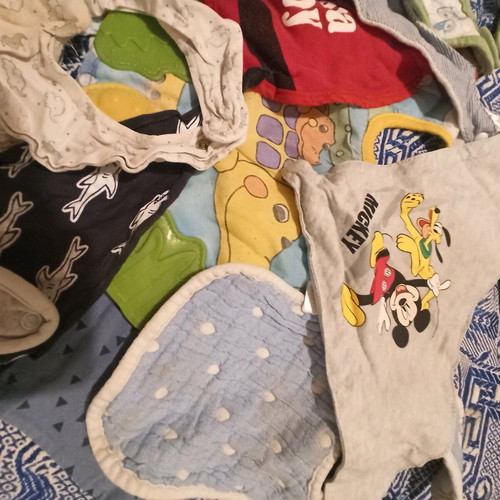 Baby bibs used, pack of 27, assorted colors and patterns