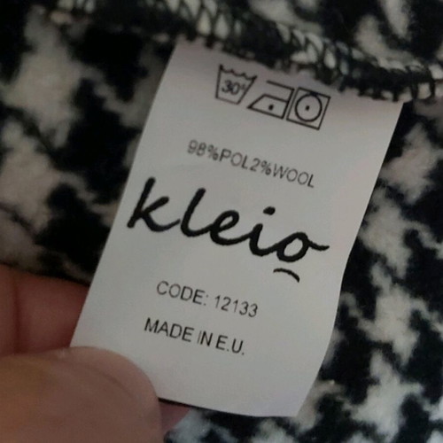 Women's outerwear like new, warm black and white jacket