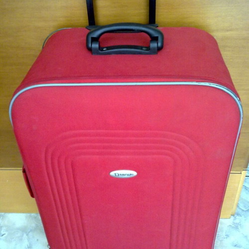 Wheeled travel suitcases, black and grey, like new