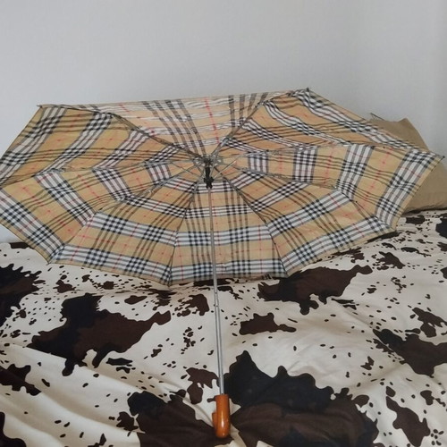 Vintage unisex folding umbrella with wooden handle, used