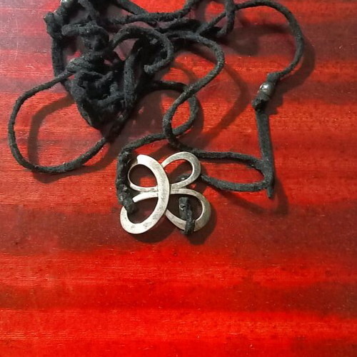 Silver necklace used with black cord, choker or bracelet style