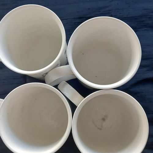 Bone China set of 4 porcelain mugs like new