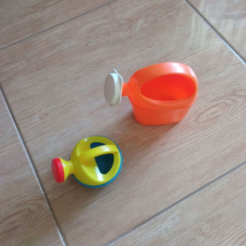 Children's watering cans used, both together