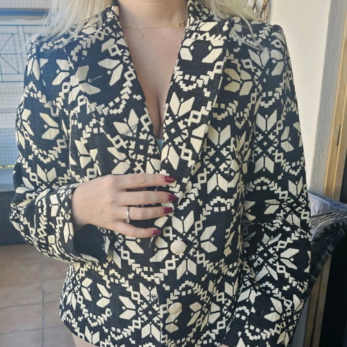Mid-length jacket like new, size 50, beige black pattern