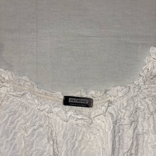 White blouse with ruffles and long sleeves like new