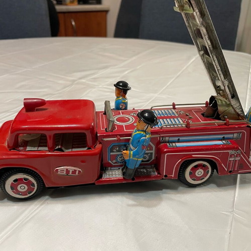 Fire truck old tin toy used Chinese made