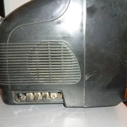 Silver portable radio TV used with AV and car adapter
