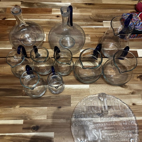 Set of 10 blown glass pitchers like new with cheese platter