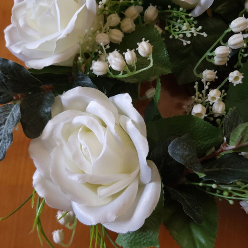 Plastic wreath new with white flowers