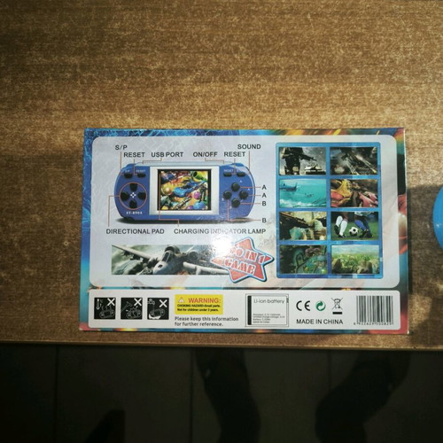 Hand consloe like new with many retro games