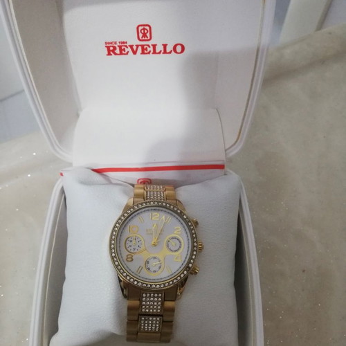 Revello women's watch new, gold color