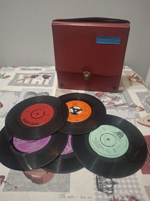 Vintage Columbia suitcase with 27 classic rock 45 rpm records, like new