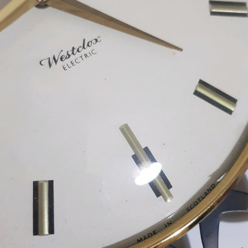 Westclox electric wall clock used, 1950s, bronze frame