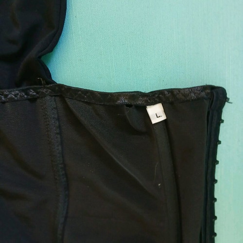 Unique halterneck corset size M/L like new, black
