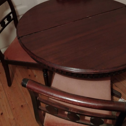 Dining set made of solid wood like new with extendable round table, 4 chairs and large buffet cabinet