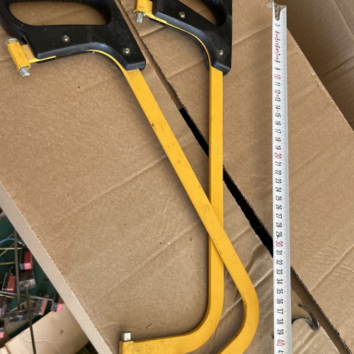 Hacksaws like new with yellow metal frame and black plastic handle